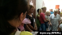 Очередь в детской поликлинике Красногвардейской районной больницы. Архивное фото