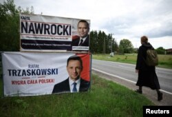 Виборчі банери головних кандидатів на пост президента Польщі