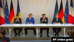 Владимир Зеленский, Ангела Меркель, Эммануэль Макрон и Владимир Путин на встрече в Париже, декабрь 2019 года