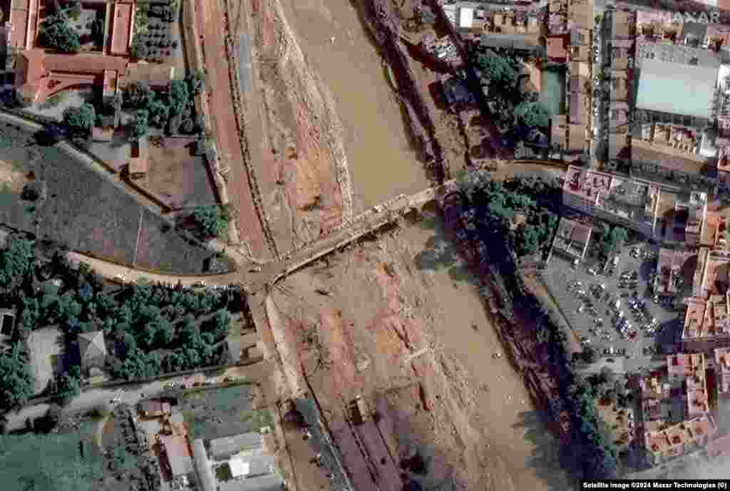 Супутниковий знімок до повені. Carrer De Gomez Ferrer, Валенсія, Іспанія. 18 жовтня 2024 року. На знімку праворуч – наслідки повені, на тому ж місці 31 жовтня 2024 року