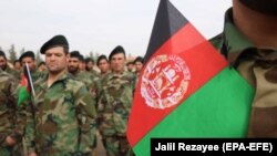 Afghan National Army soldiers attend a graduation ceremony in Herat.