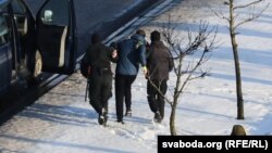 A protester is arrested in Minsk on January 23.