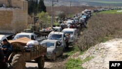 Цивільні жителі виїжджають з Афріна, Сирія, 12 березня 2018 року