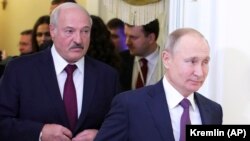Олександр Лукашенко (ліворуч) і Володимир  Путін. Санкт-Петербург, 20 грудня 2019 року