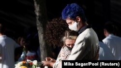 9/11: Маросими ёдбуди қурбониҳои ҳамлаҳои террористӣ дар аксҳо