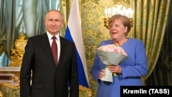 Владимир Путин и Ангела Меркель