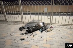 Captură de la AFPTV cu resturile unei rachete iraniene interceptate deasupra Qatarului, 23 iunie 2025.