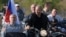 Путин за рулем, Аксенов в коляске. Президент России на байк-шоу в аннексированном Севастополе (видео)