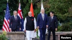 Прем'єр-міністр Австралії Ентоні Альбанезе, прем'єр-міністр Індії Нарендра Моді, президент США Джо Байден та прем'єр-міністр Японії Фуміо Кішіда.