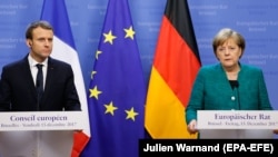 Президент Франції Емманюель Макрон і канцлер Німеччини Анґела Меркель