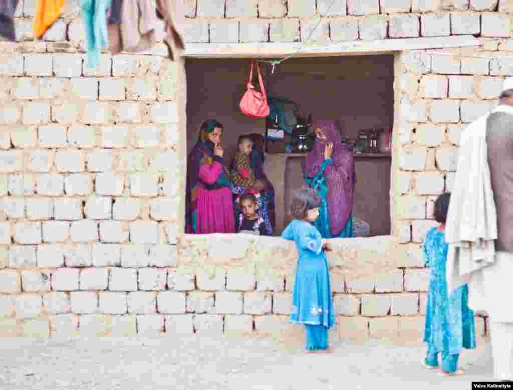 Latifa (left), a mother of five, was evicted from her home in Darra Adam Khel, a town in northwest Pakistan, where she had lived for nearly 20 years. 