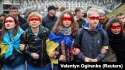 Під час акції з вимогою до влади не йти на поступки Кремлю у протистоянні України з Росією. Київ, 6 жовтня 2019 року