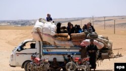 Бійці «Сирійських демократичних сил» біля Ракки, Сирія, 8 червня 2017 року