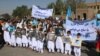 Afghans rally in Herat to support the Doha peace talks between Taliban and the Afghan government on September 21. 