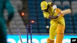 د یوګانډا لوبغاړی د اوټ کېدو پرمهال.