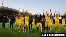 Футболісти збірної України святкують перемогу над Шотландією у відбірковому матчі Чемпіонату світу з футболу 2022. Глазго, Велика Британія, 1 червня 2022 року