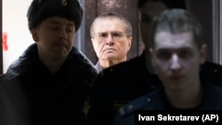 Former Russian Economic Development Minister Aleksei Ulyukayev being escorted to court.