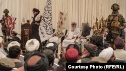 Images like this circulated on Twitter purportedly show acting interior minister Sirajuddin Haqqani with his face blurred at the Intercontinental Hotel in Kabul, where he met with relatives of "martyrs" on October 19.