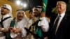 US President Trump dances with a sword during a welcome ceremony in Saudi Arabia in 2017.