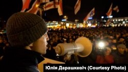Young Front leader Dzmitry Dashkevich addresses an opposition crowd during a "Go away!" campaign in 2010.