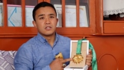 Afghan MMA Champ To Auction Medals For Attack Victims' Families