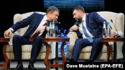 Главари группировок «ЛНР» Леонид Пасечник (слева) и «ДНР» Денис Пушилин во время форума «Русский Донбасс» в Донецке, 28 января 2021 года