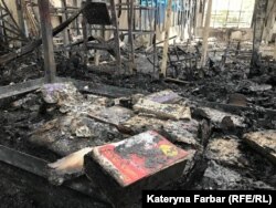 Обгорілі книжки видавництва «Український пріоритет»