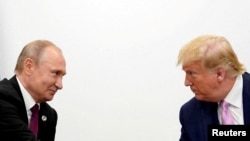 Дональд Трамп і Володимир Путін, червень 2019 року
