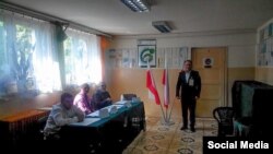 Представитель Меджлиса крымско-татарского народа наблюдает за президентскими выборами в Польше. 10.05.2015