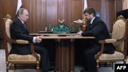 When the two men met at the Kremlin this week, Russian President Vladimir Putin (left) announced that Chechen leader Ramzan Kadyrov (right) would continue as acting head of the Caucasus republic once his current term of office expires in April.
