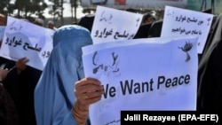 Afghans rally in support of the first round of the Doha peace talks between Taliban and the Afghan government on September 21, 2020.