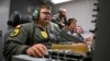 NATO surveillance operators work on computers aboard a surveillance aircraft during a flight over Polish airspace as part of the alliance's new Eastern Sentry mission on September 19.