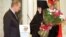 Владимир Путин награждает игуменью Иннокентию орденом Дружбы