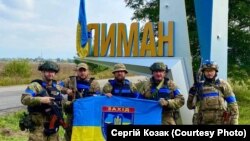 Бійці батальйону Національної поліції України «Захід» після звільнення Лиману від російської армії 2 жовтня 2022 року. Донецька область, яку президент Росії оголосив анексованою