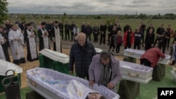 Похороны жертв российских воздушных ударов по городу Коростышев. 28 мая, 2025