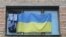 Ukraine -- natioanl flag in the hostel window (croped), Kyiv, 02May2009 