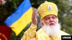 Предстоятель Української автокефальної православної церкви (УАПЦ), митрополит Київський і всієї України Макарій під час Божественної літургії біля підніжжя Андріївської церкви з нагоди 1030-ї річниці Хрещення Русі-України. Київ, 24 липня 2018 року