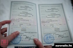Palazhanka shows her marriage certificate on December 26.