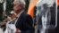 Demonstrators hold portraits of Natalya Estemirova during a rally in Moscow last year.