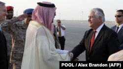 U.S. Secretary of State Rex Tillerson (right) is greeted as he arrives at King Salman Air Base on October 21 in Riyadh, Saudi Arabia.