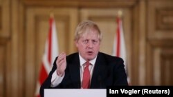 Британський прем’єр-міністр Боріс Джонсон виступає на пресконференції щодо COVID-19. Лондон, 22 березня 2020 року