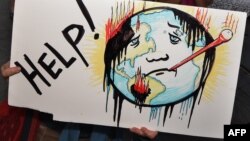 Плакат на одній з акцій екоактивістів проти зміни клімату, Лос-Анджелес, США (фото архівне)