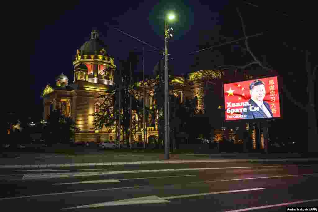 A screen says "thanks” to Chinese President Xi Jinping next to Serbia’s National Assembly building. In late April, a senior EU official said, “If you could go to Belgrade, you would see billboards on the main streets of President Xi from China, saying ‘Thanks brother Xi, you are the only one to help us.' Which is very funny, because I have never seen a billboard saying, ‘Thanks to the EU for the help it has been providing us.’ And we have been providing a lot of help to Serbia and other countries of the Balkans.”