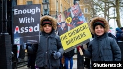 Демонстрація проти Башара Асада та Володимира Путіна