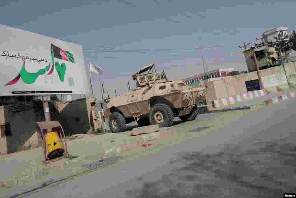 An abandoned U.S. armored vehicle seen in Kabul on August 29. U.S. forces left behind billions of dollars' worth of military equipment as they evacuated Afghanistan -- much of it meant for the Afghan National Army. The modern weaponry has now fallen into the hands of the Taliban.