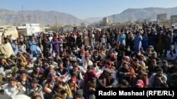 A protest for Internet services makes its way through the main bazaar in Wana, South Waziristan, on February 11.