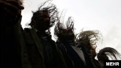 Iranian dervishes dance their traditional collective dance. Minority Iranian religious groups like these, who face persecution from authorities, have turned increasingly to the Internet for mutual support and to reach out to potential fellow believers.