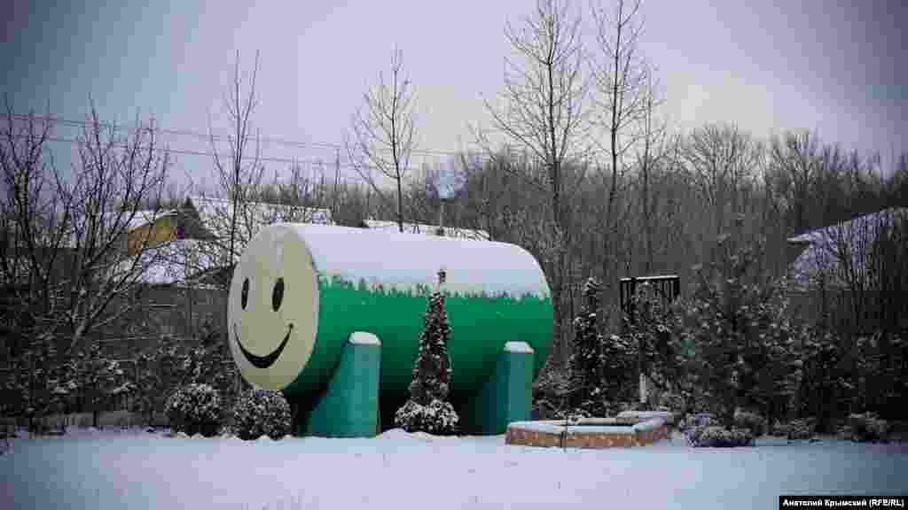 «Улыбчивый» бак для поливной воды