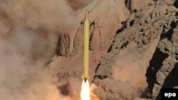 Iran -- An Iranian long range missile Qadr is launched at an undisclosed location in Iran, March 9, 2016