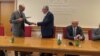 Rektor Univerziteta u Severnoj Mitrovici Zdravko Vitošević i direktor Ruskog doma Jevgenije Baranov nakon potpisivanja Sporazuma o saradnji, u prisustvu ministra u Vladi Kosova Gorana Rakića(prvi desno) i poslanika Skupštine Kosova, Igora Simića (drugi desno)